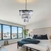 (NEW SKU:W1340P189315) 20" Modern Crystal Chandelier with Black Finish – Elegant 7-Light Pendant Light with 3 Tier Crystal Strands for Dining Room, L